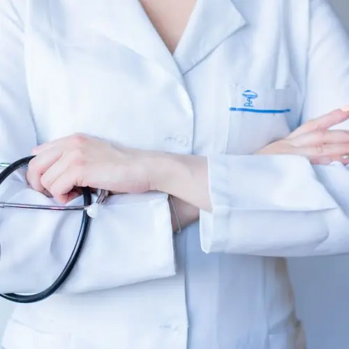 Doctor in a white coat with a stethoscope